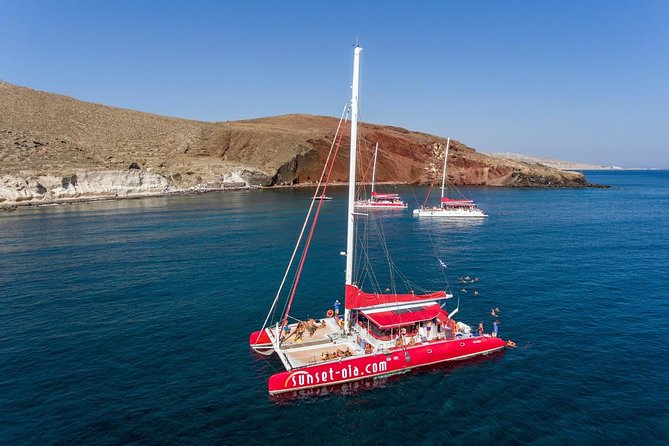 Sailing Catamaran Cruise in Santorini with BBQ, Drinks and Transfer - Hotel Pickup to the Port: The Most Effortless Start in Santorini