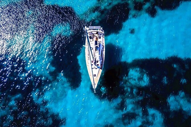 Sailsational Luxury Santorini Catamaran Sunset Cruise with Dinner - Red Beach and White Beach: seeing volcanic color up close