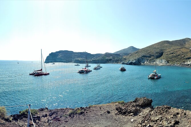 Sailsational Luxury Santorini Catamaran Sunset Cruise with Dinner - Mesa Pigadia Beach dinner: Greek food on the water as the sun goes down