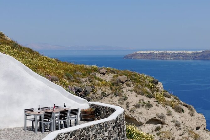 Santorini 6 hours Day tour and Lunch - Stop 4: Fira for cliffs, shops, and the blue-domed look
