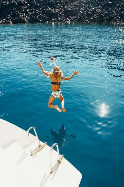 Santorini: All-Inclusive Private Catamaran Experience - Lunch or Dinner at Sea: Fresh Greek Flavors Plus Drinks