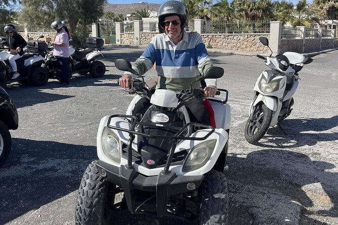 Santorini ATV Highlights Tour: Oia, Viewpoints & Volcanic Beaches - Perissa black sand beach: volcanic contrast in 20 minutes