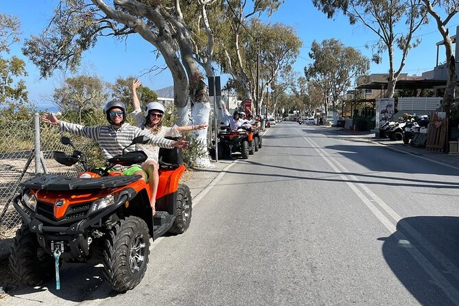Santorini ATV Highlights Tour: Oia, Viewpoints & Volcanic Beaches - Red Beach photo stop and Emporio windmills on the return loop