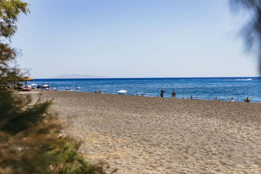 Santorini: ATV Quad Bike Tour with Lunch and Pickup - Vlichada Beach and volcanic cliffs: variety beyond the postcard