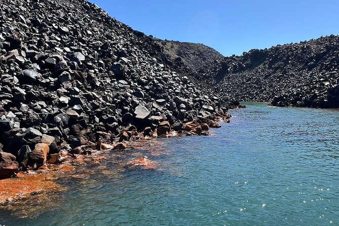 Santorini: Boat tour to Volcano, Hot Springs & Thirasia island - Palea Kameni Hot Springs: Warm Water, Sulfur Stains, and Real Swim Time