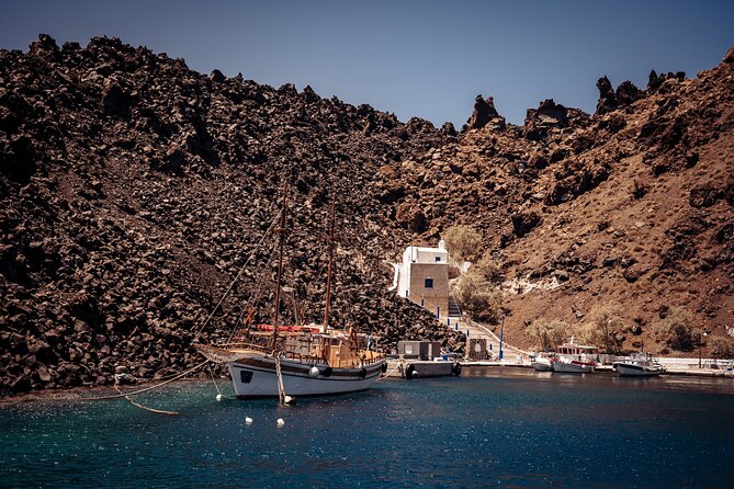 Santorini: Boat tour to Volcano, Hot Springs & Thirasia island - On-Board Comfort: Restroom, Noodles, Towel, and a Glass of Wine