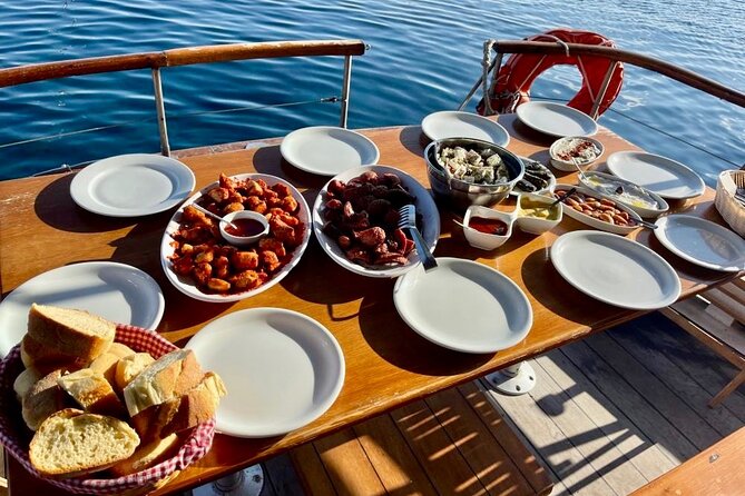 Santorini Caldera Day Traditional Cruise with Meal and Drinks - Stop by Stop: What You’ll Do and What It Looks Like