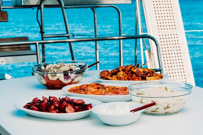 Santorini Caldera Gold Day Cruise with BBQ on board and Open Bar - The Route Around the Caldera: Vlychada to Amoudi Bay