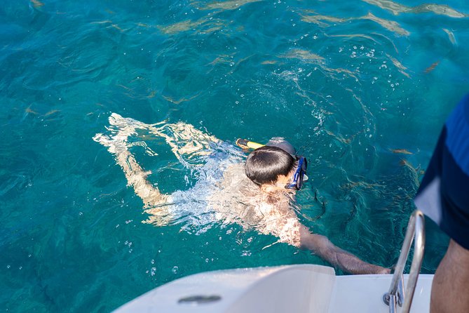 Santorini Caldera Gold Day Cruise with BBQ on board and Open Bar - Hot Springs and Snorkeling: How to Get the Most From the Water