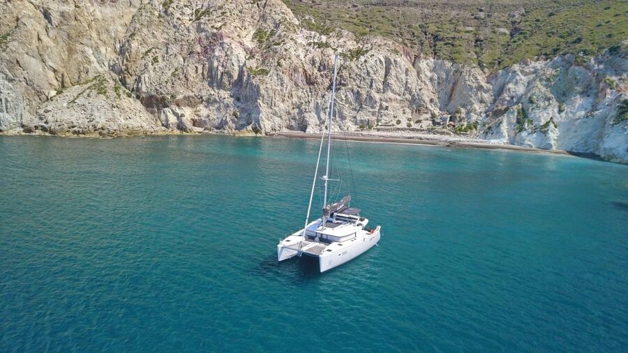 Santorini: Caldera Luxury Catamaran Cruise w/ Meal & Drinks - Mésa Pigádia and the Akrotiri Lighthouse pass: a break from the big icons