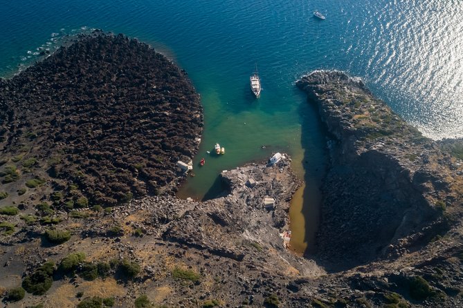 Santorini Caldera Morning Cruise With King Thiras Boat - Cruising Back Past Oia: Photos From Below