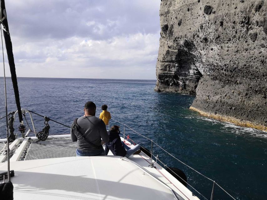 Santorini Caldera: Panorama Winter Cruise - Sunset Photo Time: What to Wear and How to Work the Deck