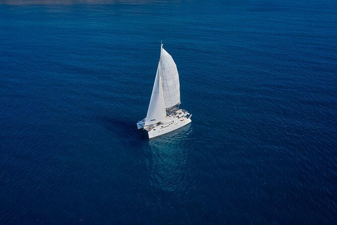 Santorini: Caldera Private Catamaran Cruise with Meal & Drinks - Swimming and snorkeling at your own pace (and why that matters)
