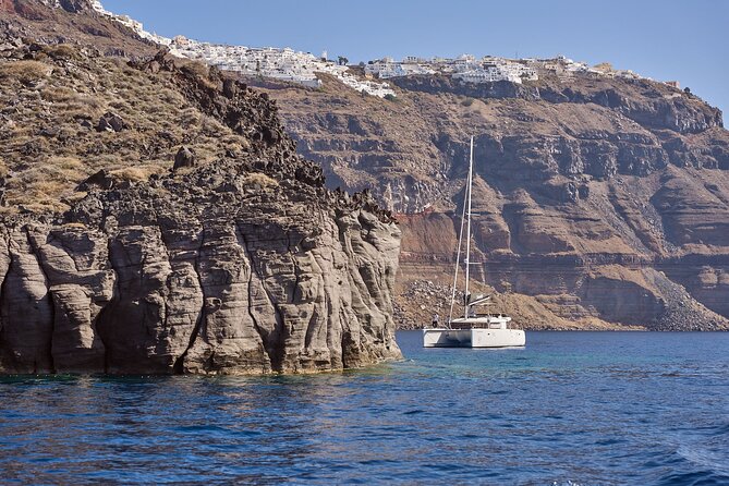 Santorini: Caldera Private Catamaran Cruise with Meal & Drinks - Price check: what $649.58 per person covers (and how it adds up)