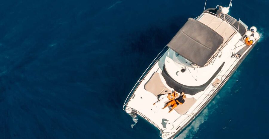 Santorini: Caldera Private Power Catamaran Cruise - Thirassia: a calmer island stop with real fishermen vibes