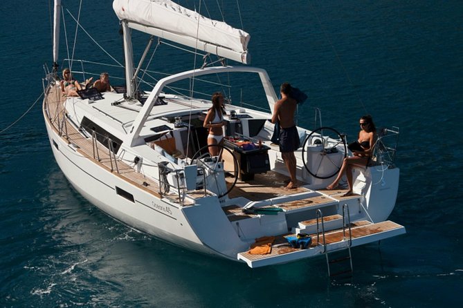 Santorini Caldera Private Sailing Boat Cruise - Who’s at the Helm: Captain, Host, and On-Board Comfort