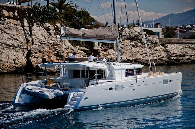 Santorini Caldera Sailing Tour with BBQ Lunch and Drinks - Sailing By the Old Venetian Lighthouse and Indian Head Mountain