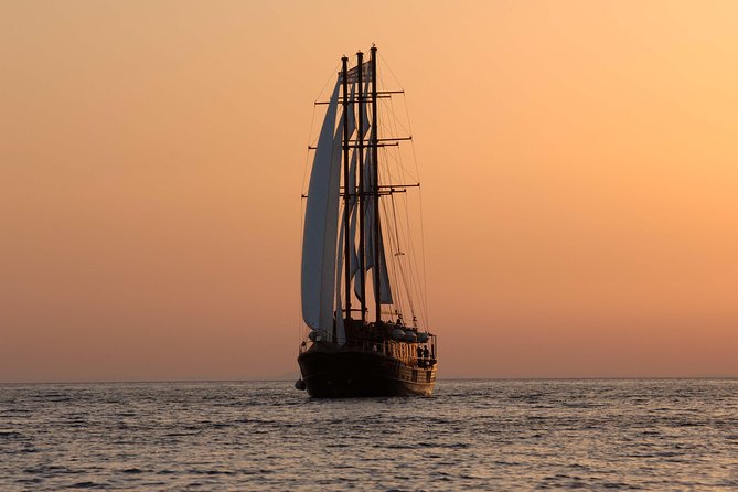 Santorini Caldera Sunset Sailing Cruise with Dinner and Wine - Oia Sunset from the Water: Why Sea-Level Beats Shorelines