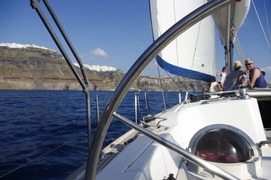 Santorini Caldera: Sunset Sailing Cruise with Meal - Red Beach and White Beach: short stops that still deliver