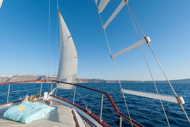 Santorini Caldera Sunset Traditional Cruise with Meal and Drinks - Sailing Around the Volcano: Pretty Views Without the Hiking