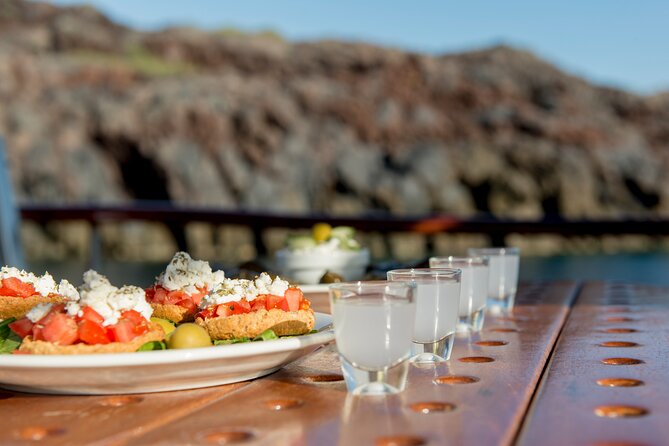 Santorini Caldera Sunset Traditional Cruise with Meal and Drinks - Mesa Pigadia and Akrotiri Lighthouse: Passing Details You’ll Actually Remember