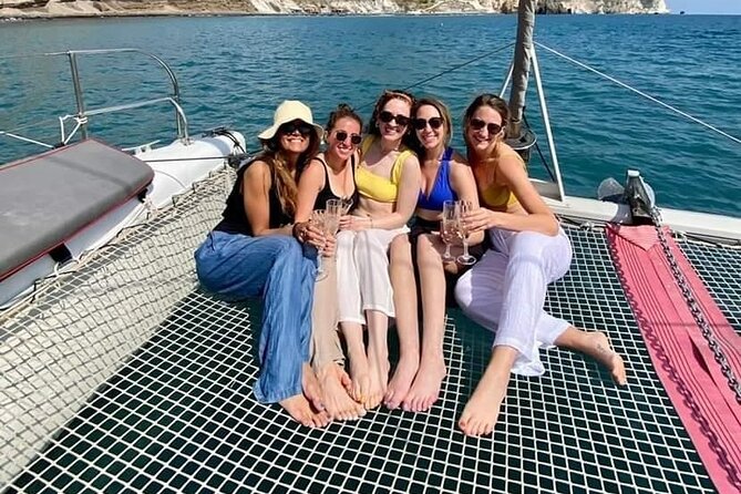 Santorini Catamaran Cruise – 5-Hour Private Sailing Experience - Red Beach swim time: clear water and big photo moments