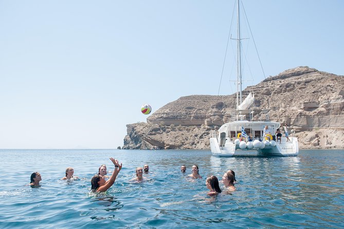 Santorini Catamaran Cruise with Fresh Meal and Open Bar - White Beach: Crystal Water, White Rocks, and a More Quiet Feel