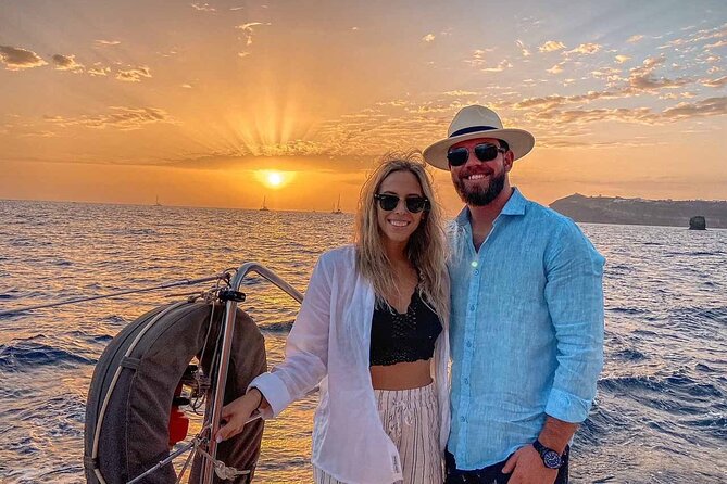 Santorini Catamaran Cruise with Greek Meal, Open-Bar and Sunset - The hot springs stop at Nea Kameni: warm water, volcanic vibe