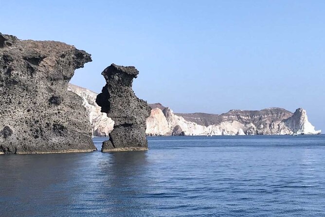 Santorini Catamaran Cruise with Greek Meal, Open-Bar and Sunset - Red Beach swimming and snorkeling: the color show