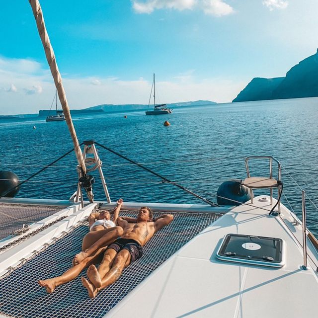 Santorini: Catamaran Cruise with Meal & Open Bar - Thirassia island hour: snorkeling plus a real meal onboard