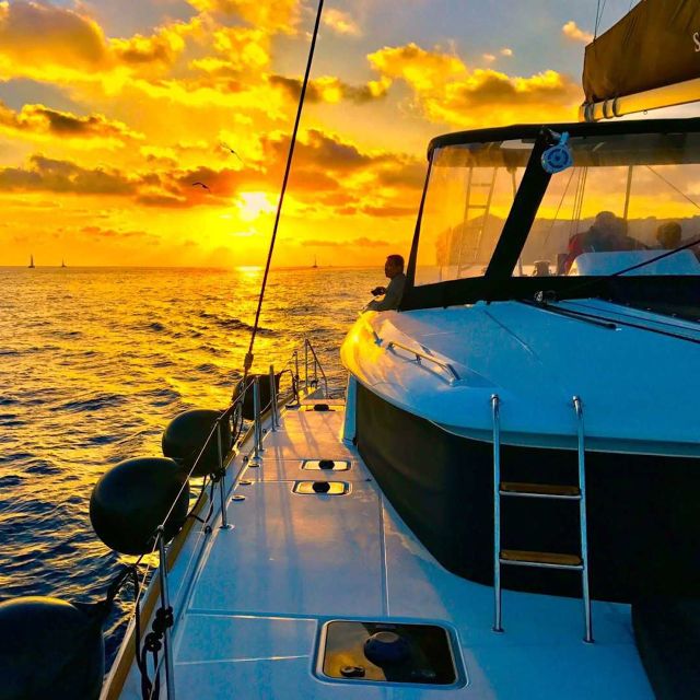 Santorini: Catamaran Cruise with Meal & Open Bar - The deck-time rhythm: drinks, music, and the sunset from the water