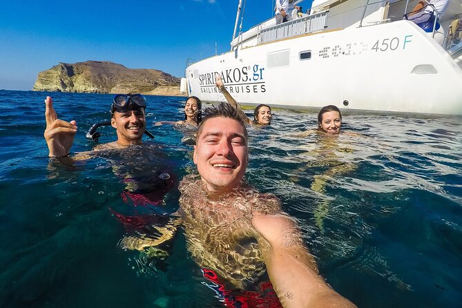 Santorini Classic Catamaran Cruise with BBQ, Drinks and Transfers - Volcano views and the BBQ-hour timing near the caldera