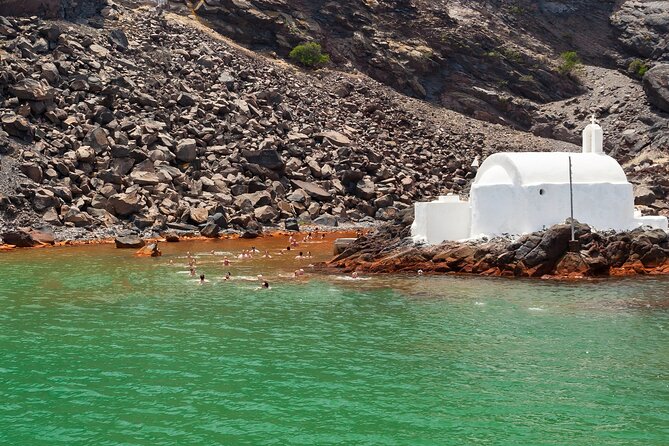 Santorini Classic Catamaran Cruise with BBQ, Drinks and Transfers - Practical tips: sea-sickness, wind, and how to get comfortable