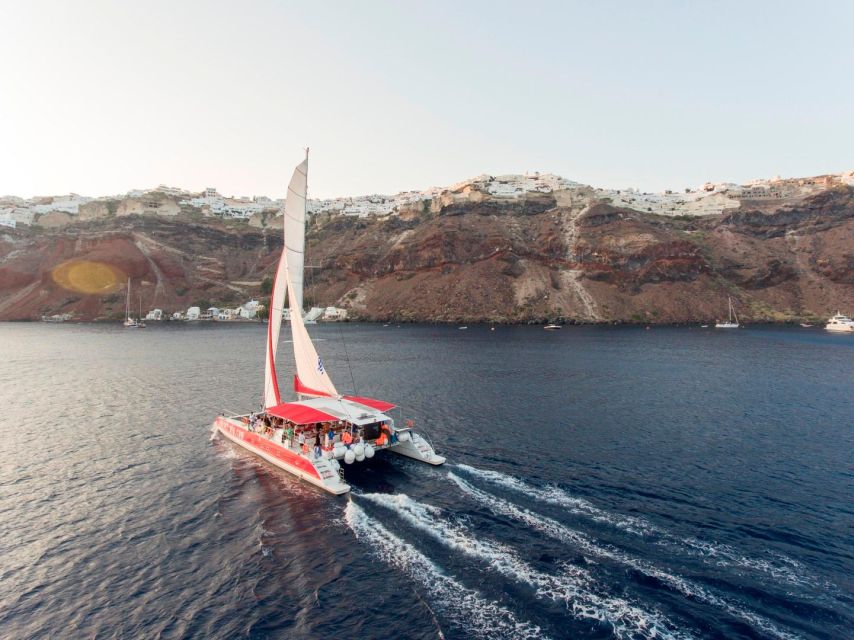 Santorini: Cruise Catamaran with BBQ & Drinks Day or Sunset - Red Beach and White Beach: your swim-and-snorkel payoff