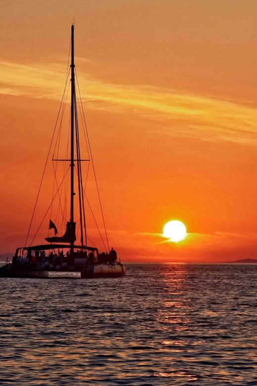 Santorini: Cruise Catamaran with BBQ & Drinks Day or Sunset - Sunset from Oia: what changes on the evening departure