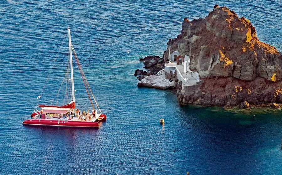 Santorini: Cruise Catamaran with BBQ & Drinks Day or Sunset - Getting to the boat: pickup near Thera and smooth drop-off