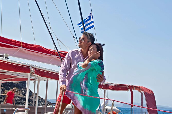 Santorini Cruise on Catamaran with BBQ & Open Bar - The Volcano Hot Springs Stop: Black Rocks, Sulfur Water, and a Real Swim Moment