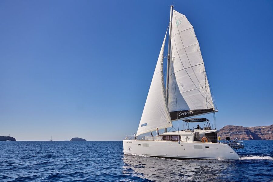 Santorini: Day Luxury Catamaran Cruise with Meal & Drinks - Pickup, Getting to the Catamaran, and How the Morning Flows