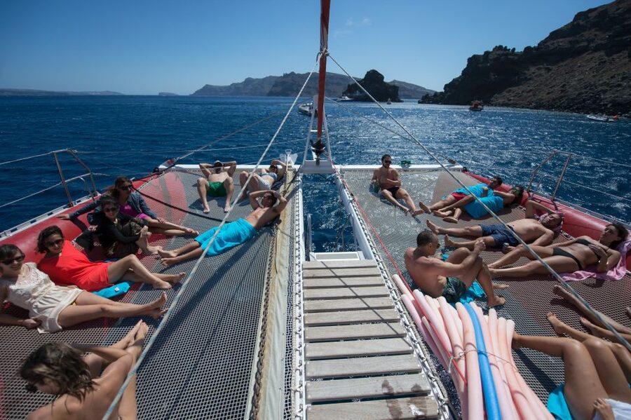 Santorini: Dream Catcher 5-hour Sailing Trip in the Caldera - From Pickup to Vlihada Marina: How the Day Starts