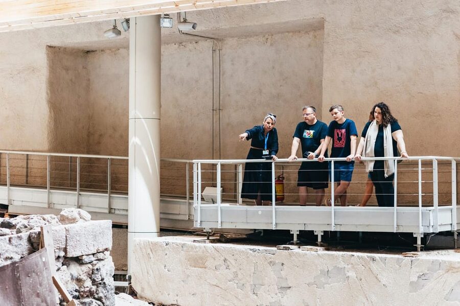 Santorini: Experience Akrotiri with a Licensed Tour Guide - Bronze Age buildings you can actually picture: 2–3 storied complexes