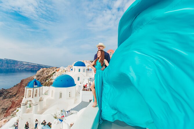 Santorini flying dress photo - Photo delivery: what you can plan for (and what to confirm)