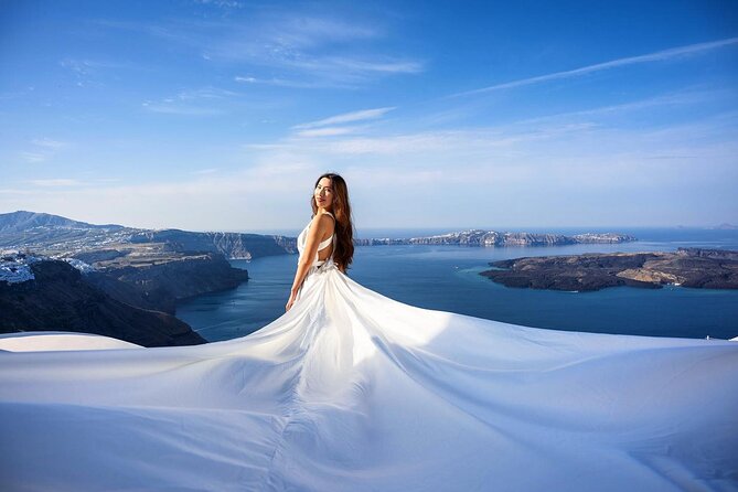 Santorini Flying Dress Private Luxury Tour Experience & Pick up - The 1-hour rhythm near the blue dome and the caldera