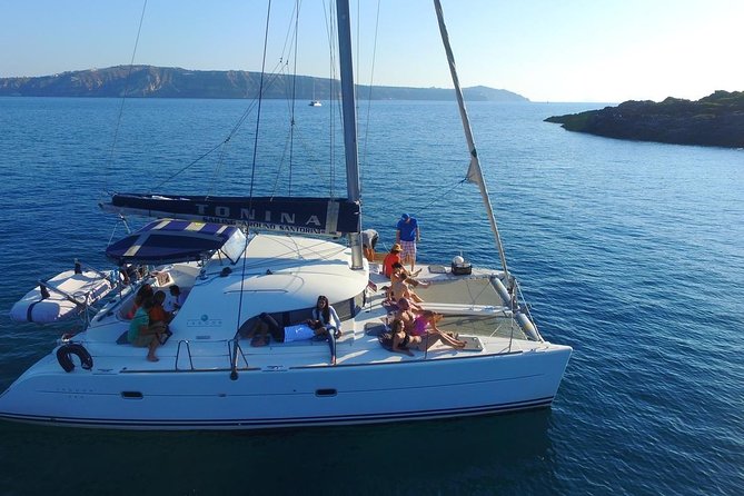 Santorini Full Day Catamaran Private Cruise incl. Meal, Drinks & Free Transport - Volcano caldera and hot springs: what the sulfur stop really means