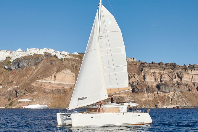 Santorini Gold Catamaran Cruise with BBQ, Drinks and Hotel Pickup - Stop-by-stop: what each location gives you