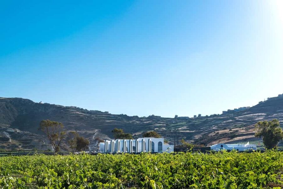 Santorini: Guided Wine Tour with Pickup and Snacks - Prophet Elias Mountain and the Monastery Moment