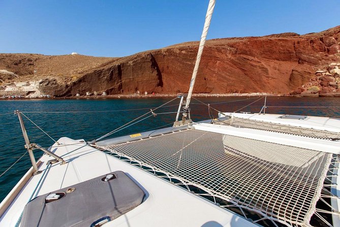 Santorini Half Day Catamaran Private Cruise incl. Meal, Drinks & Free Transport - Palia Kameni and Santorini Volcano: the sulfur hot springs moment