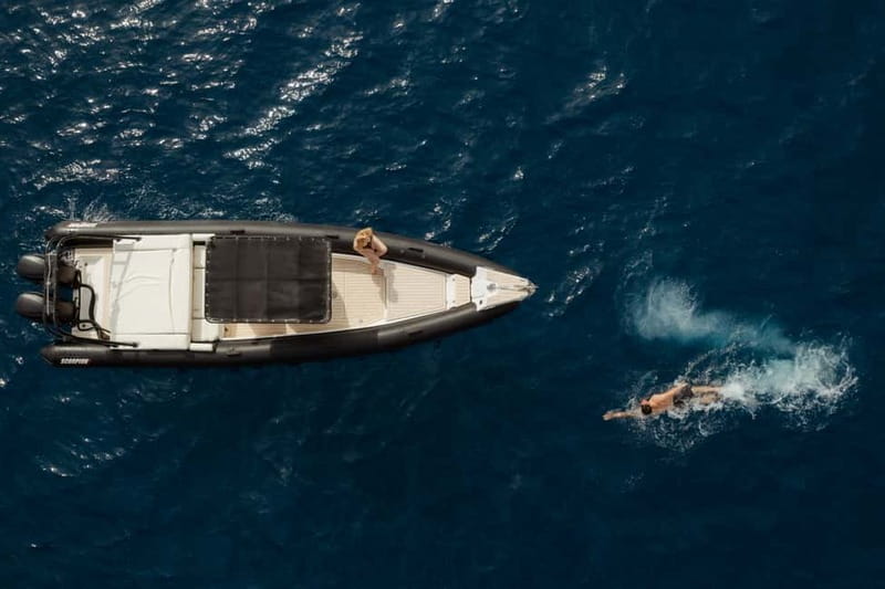 Santorini: half day exclusive speedboat cruise - Palaiá Kaméni: black-sand scenery plus more swim/snorkel time