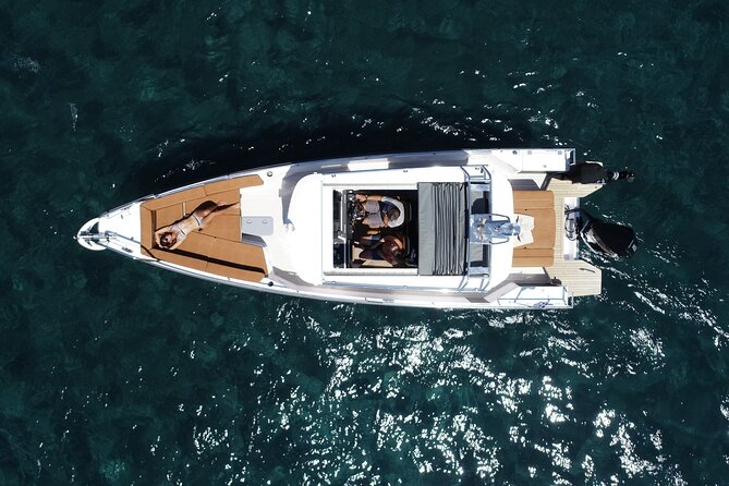 Santorini Half Day MotorCruiser Private Cruise incl. Meal,Drinks &Free Transport - Faros lighthouse and Aspronisi: the “small detours” that feel special
