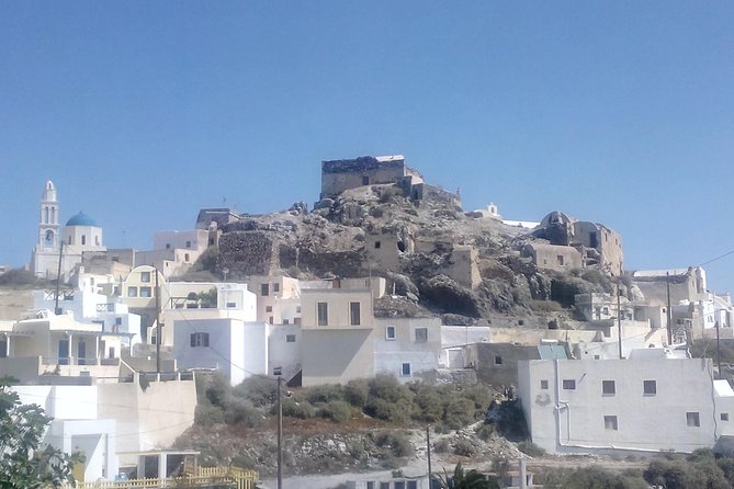 Santorini Highlights and Venetian Castles Small-Group Day Tour - Akrotiri’s castle photo stop: short, scenic, and strategic