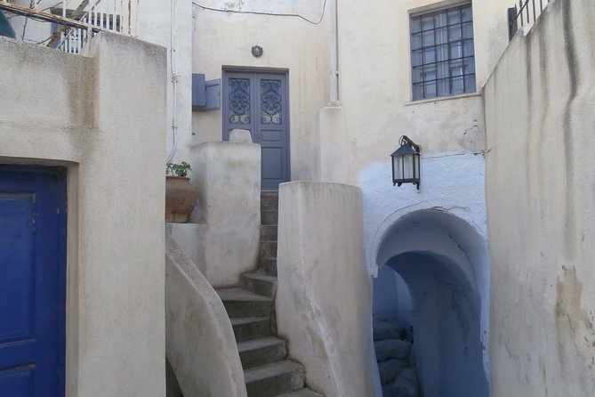 Santorini Highlights& Wine Tasting Private Tour - Akrotiri pass-by: prehistoric site vibes plus lighthouse photos